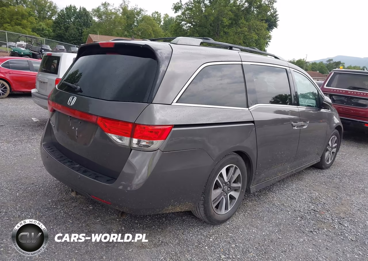 2014 Honda Odyssey Touring-Touring Elite VIN:5FNRL5H95EB105057 - 4