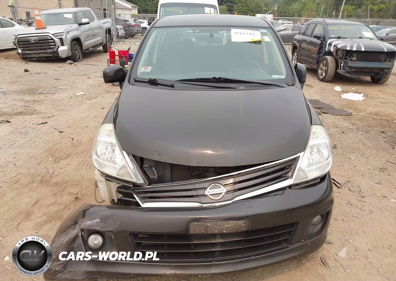 2010 Nissan Versa 1.8Sl VIN:3N1BC1CP4AL399677 - 13