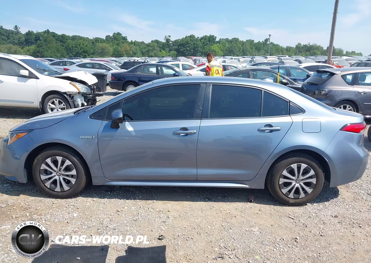 2021 Toyota Corolla Hybrid Le VIN:JTDEAMDE0MJ027084 - 14