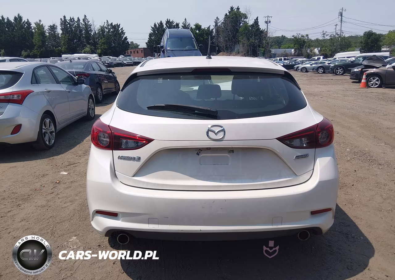 2018 Mazda Mazda3 Touring VIN:3MZBN1L36JM168517 - 16