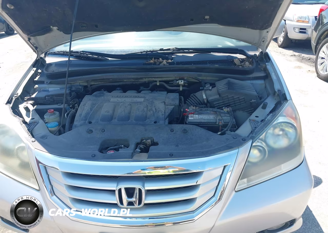 2010 Honda Odyssey Ex-L VIN:5FNRL3H72AB009710 - 10
