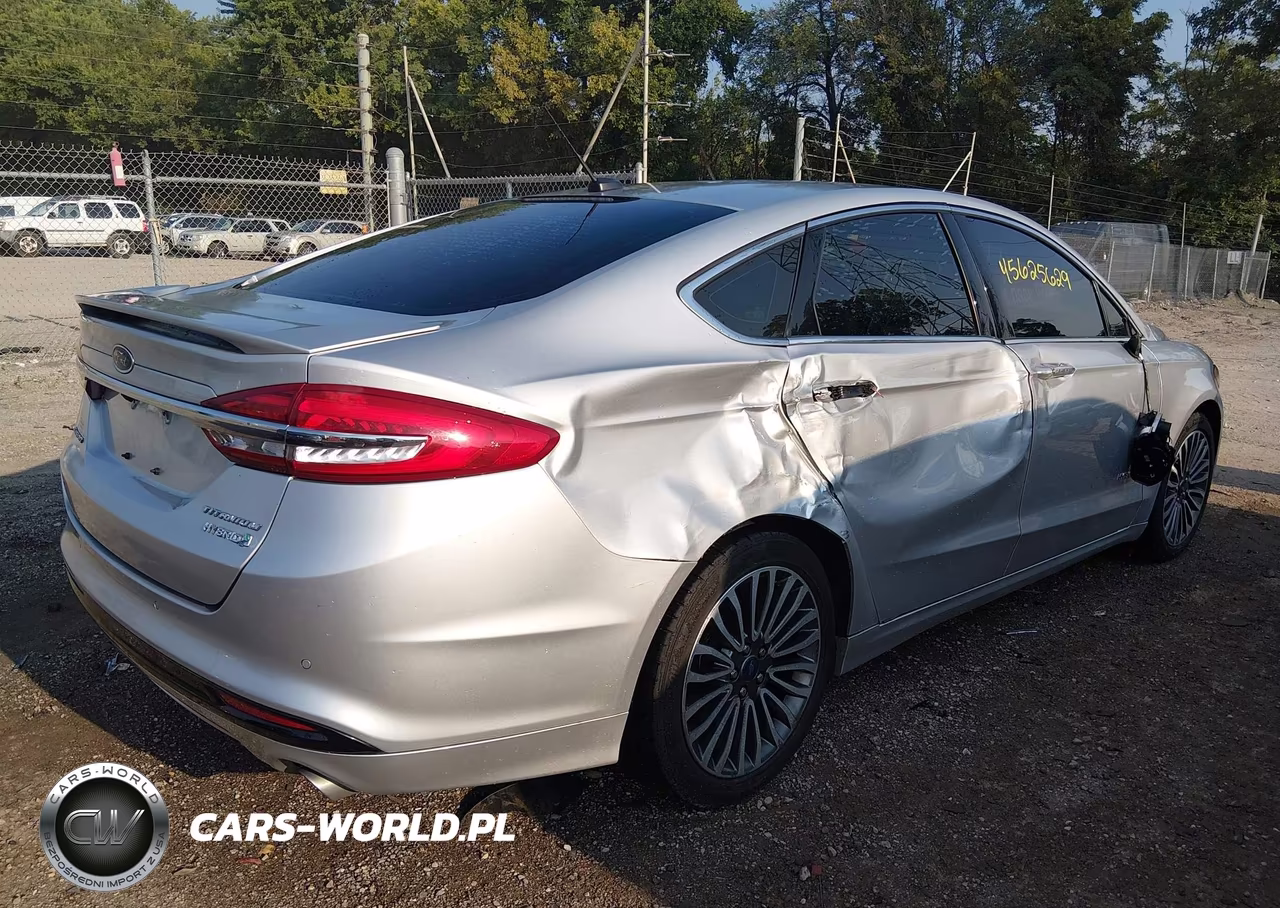 2017 Ford Fusion Hybrid Titanium VIN:3FA6P0RU4HR323075 - 4
