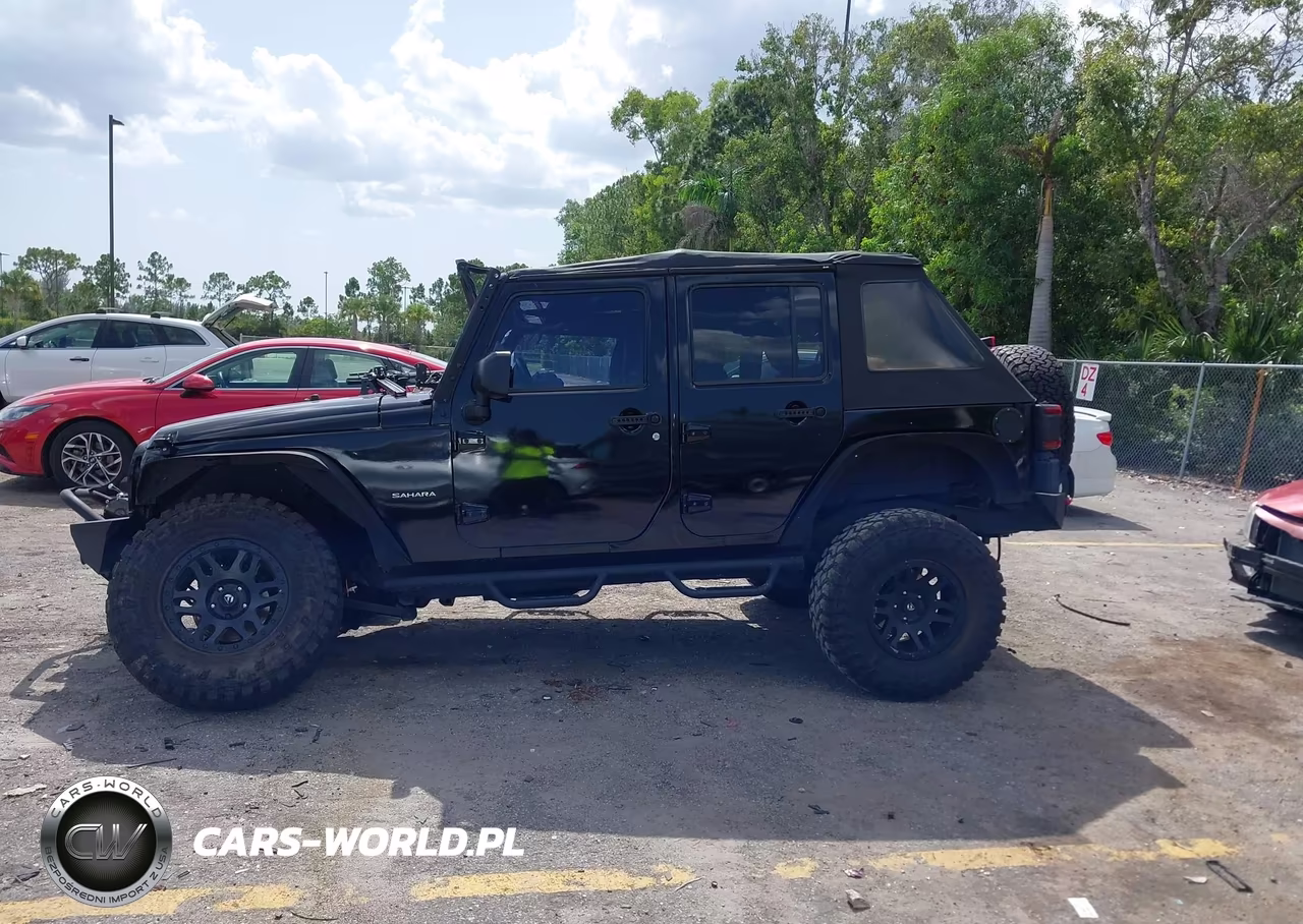 2015 Jeep Wrangler Unlimited Sahara VIN:1C4BJWEG2FL594807 - 13