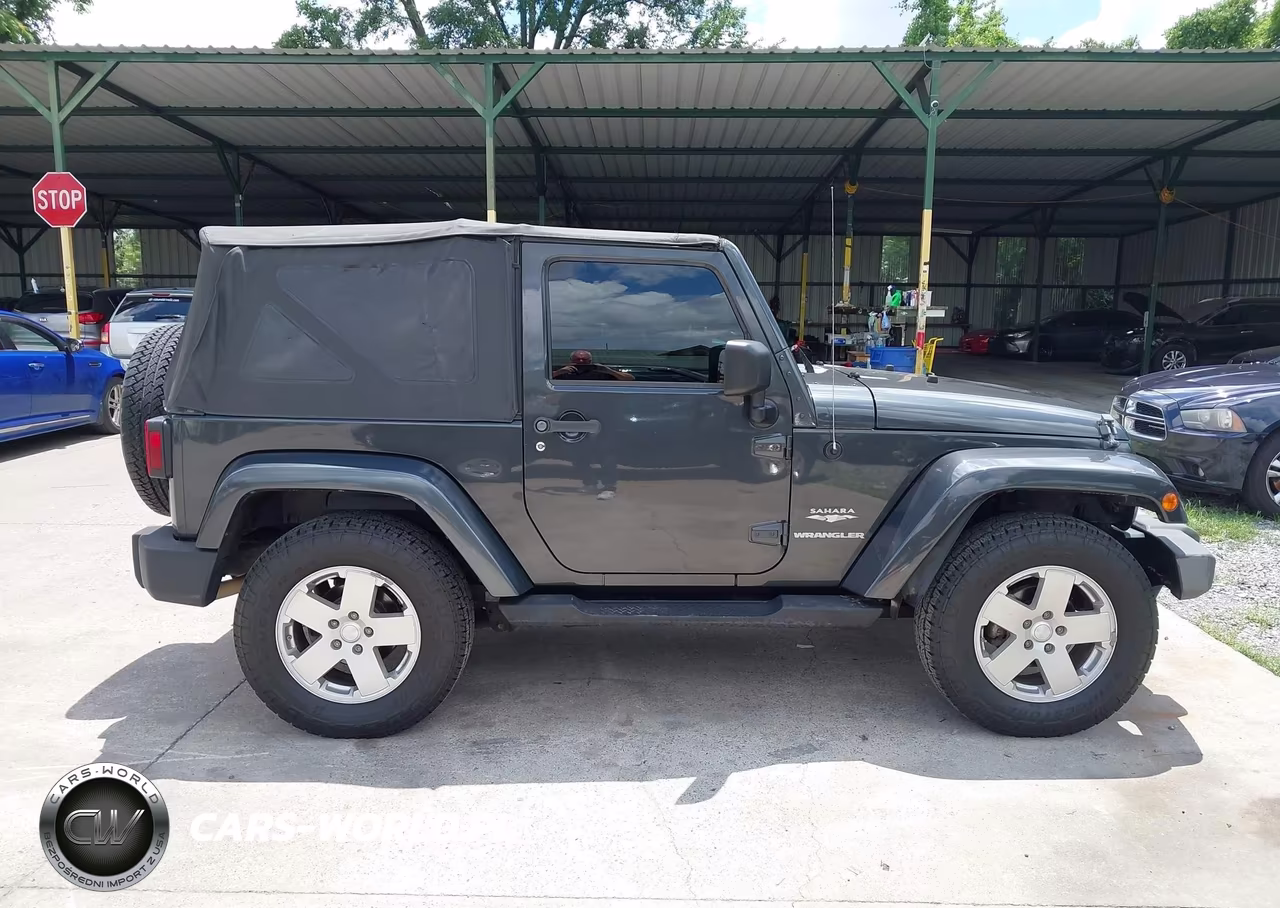 2010 Jeep Wrangler Sahara VIN:1J4AA5D11AL133393 - 13