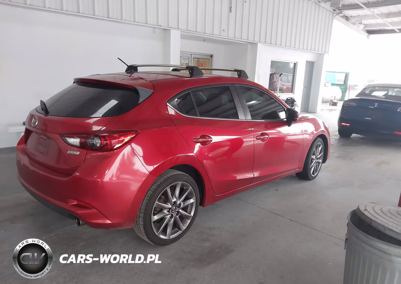 2018 Mazda Mazda3 Touring VIN:3MZBN1L32JM161919 - 4