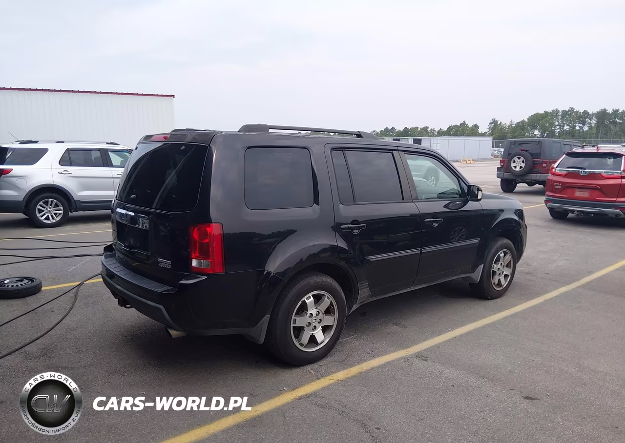 2010 Honda Pilot Touring VIN:5FNYF4H96AB029159 - 4