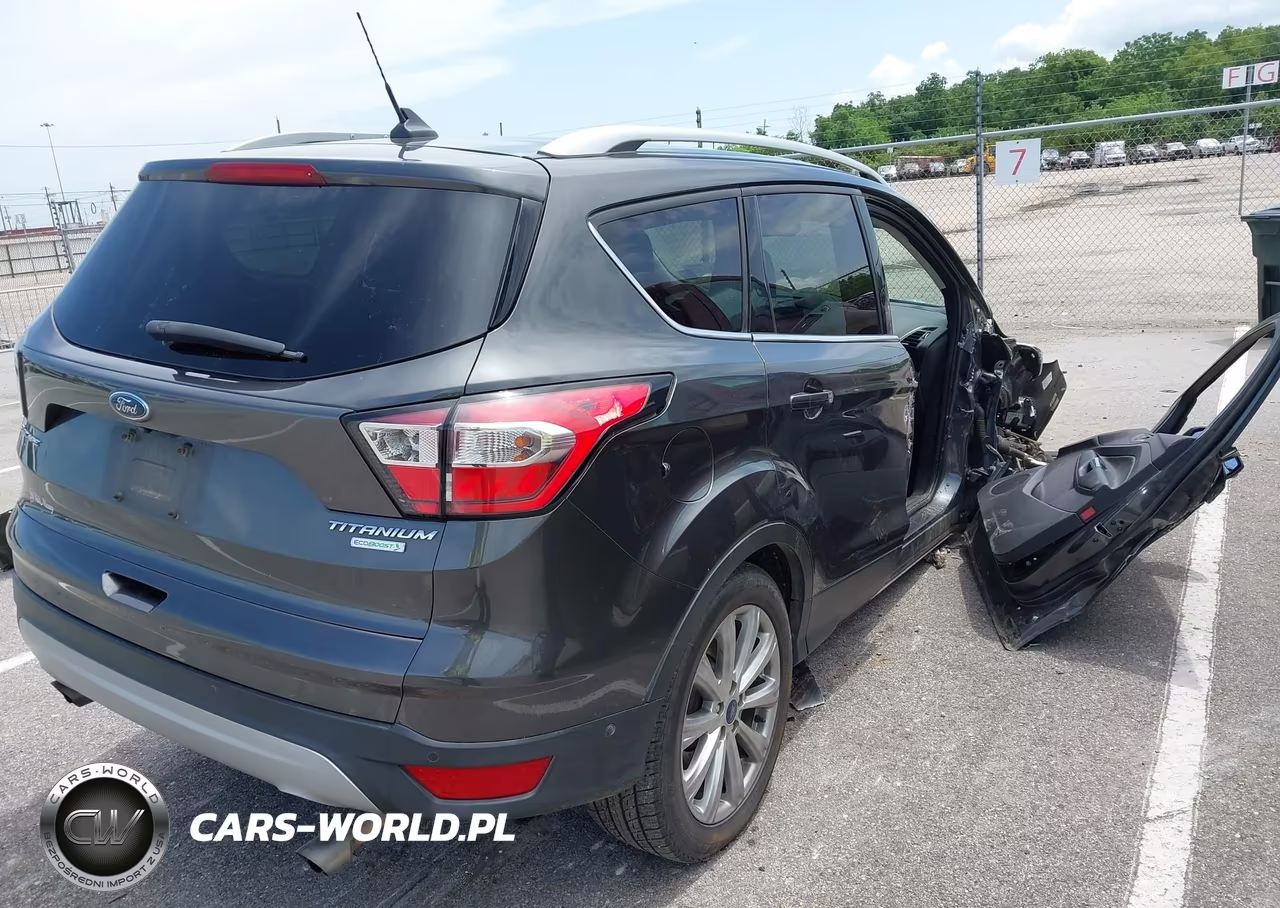 2018 Ford Escape Titanium VIN:1FMCU0J91JUD43615 - 4
