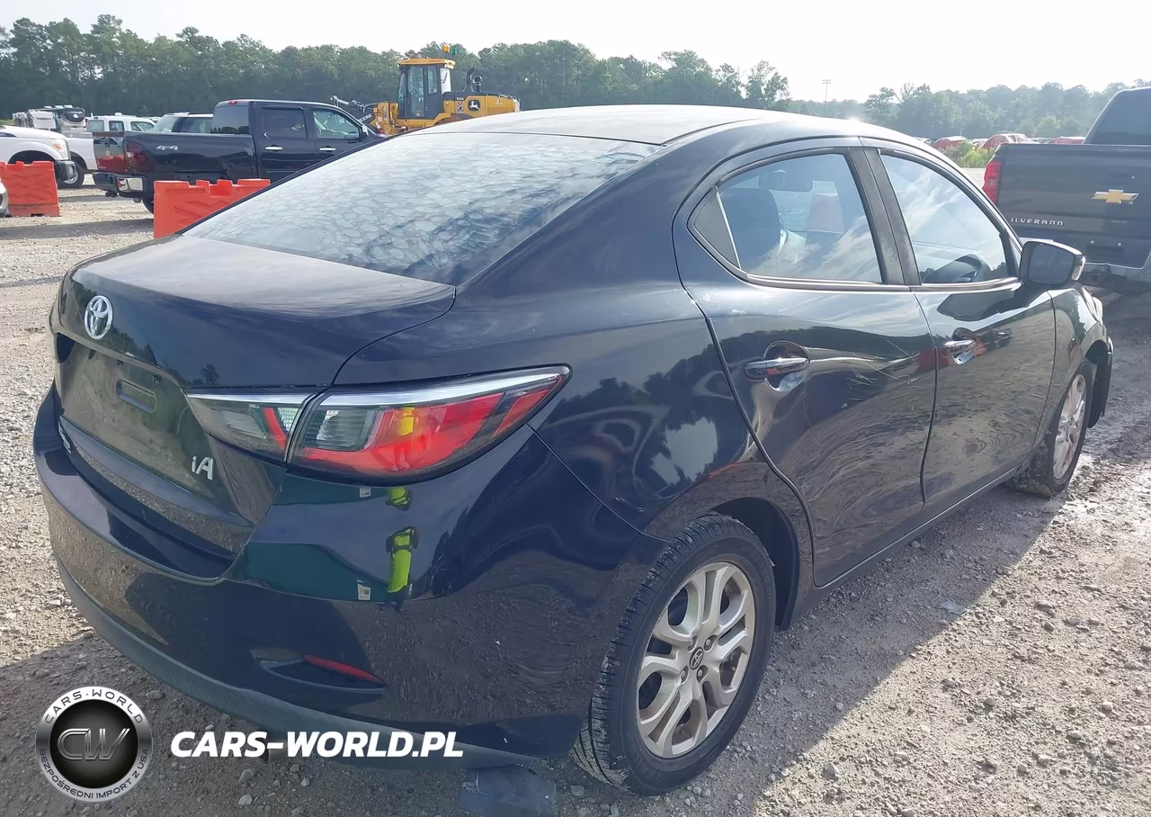 2017 Toyota Yaris Ia VIN:3MYDLBYVXHY153234 - 4