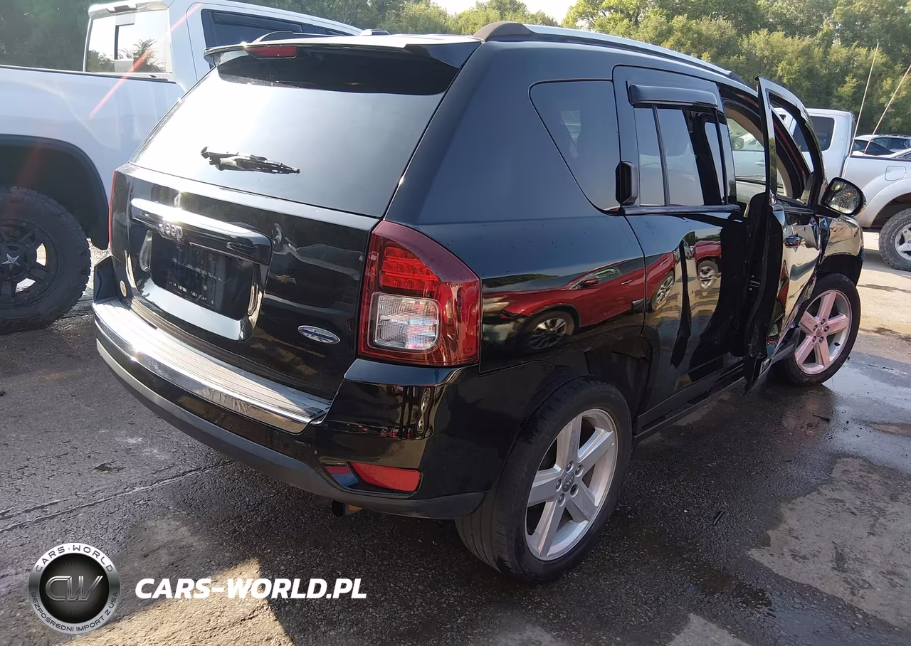 2014 Jeep Compass High Altitude VIN:1C4NJCEA5ED729858 - 4