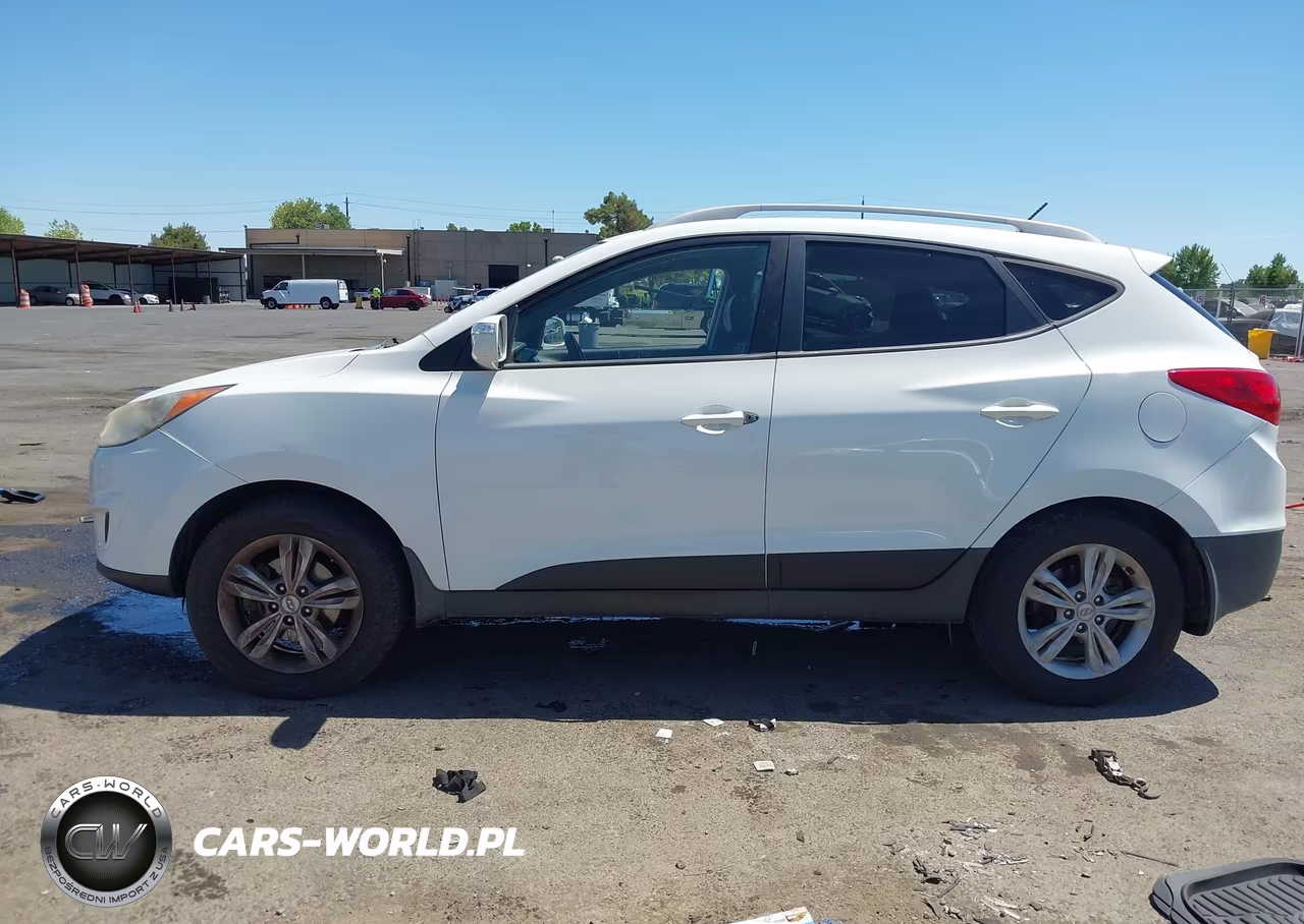 2012 Hyundai Tucson Gls VIN:KM8JUCAC1CU531865 - 14