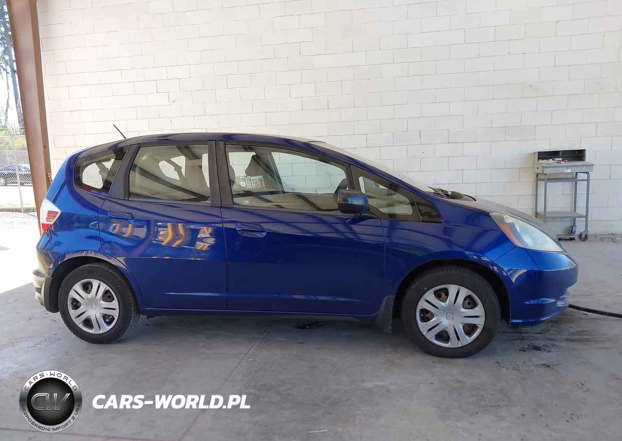 2011 Honda Fit VIN:JHMGE8H32BC019498 - 13