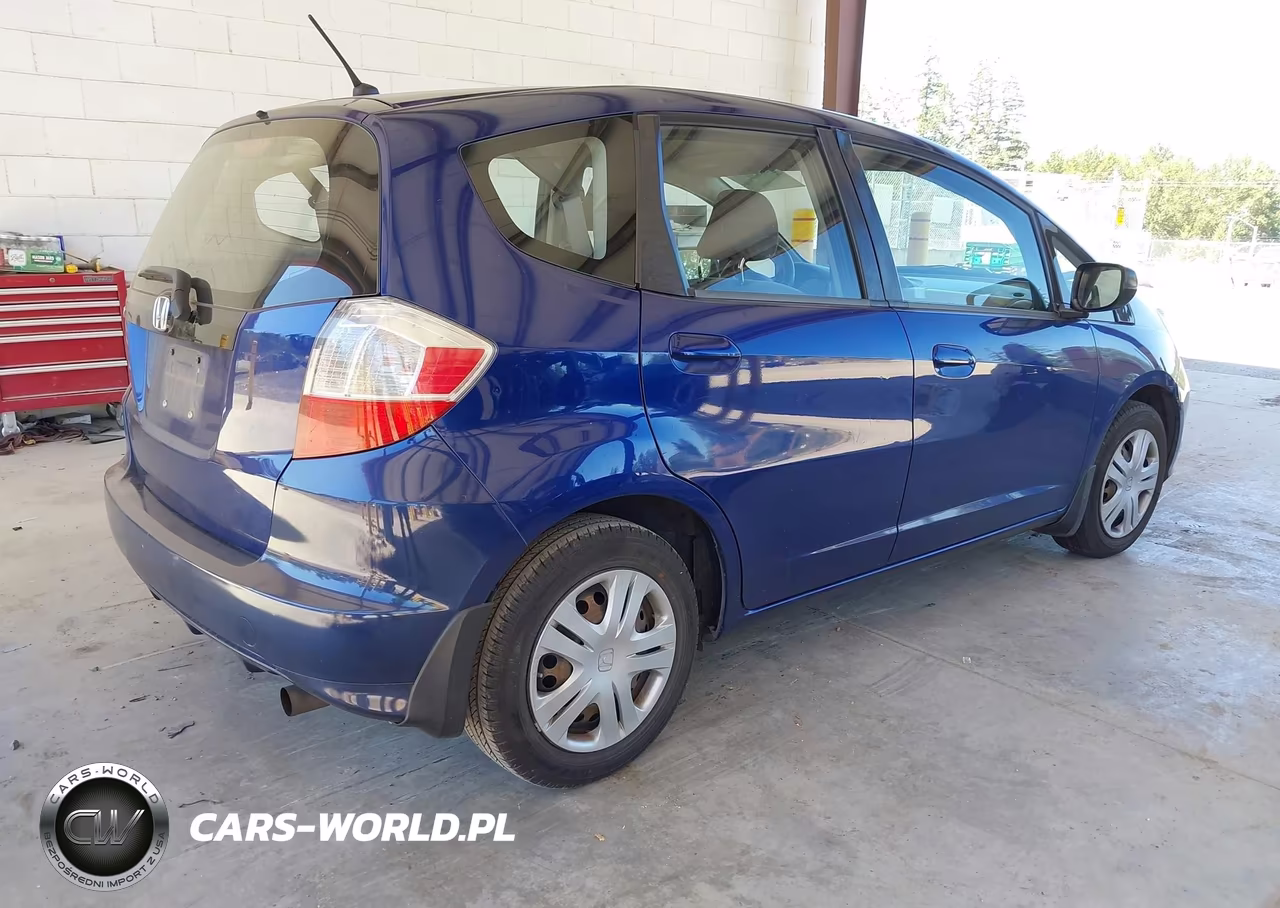 2011 Honda Fit VIN:JHMGE8H32BC019498 - 4