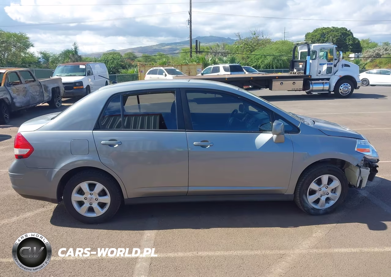 2010 Nissan Versa 1.8Sl VIN:3N1BC1AP3AL389970 - 14