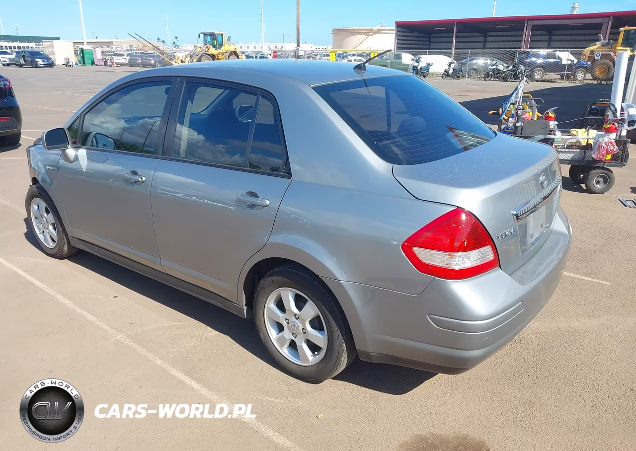 2010 Nissan Versa 1.8Sl VIN:3N1BC1AP3AL389970 - 3