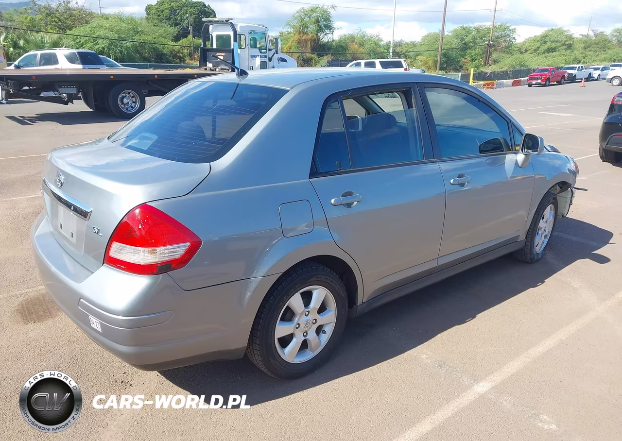 2010 Nissan Versa 1.8Sl VIN:3N1BC1AP3AL389970 - 4