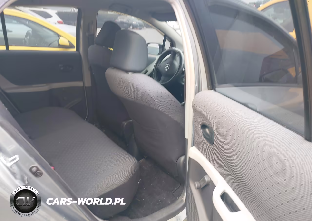 2009 Toyota Yaris VIN:JTDKT903995240498 - 8