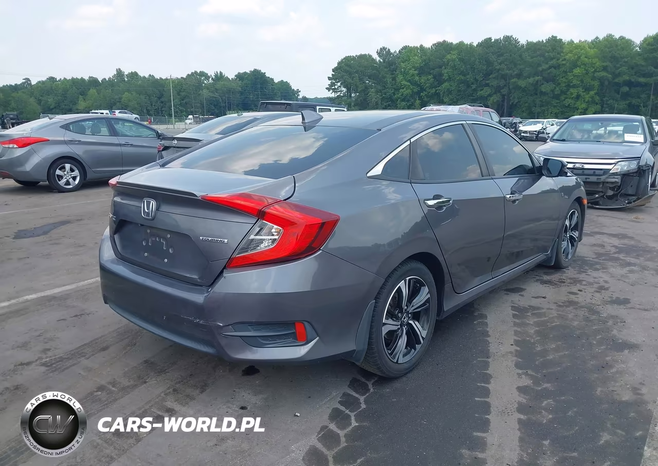 2017 Honda Civic Touring VIN:2HGFC1F90HH635242 - 4