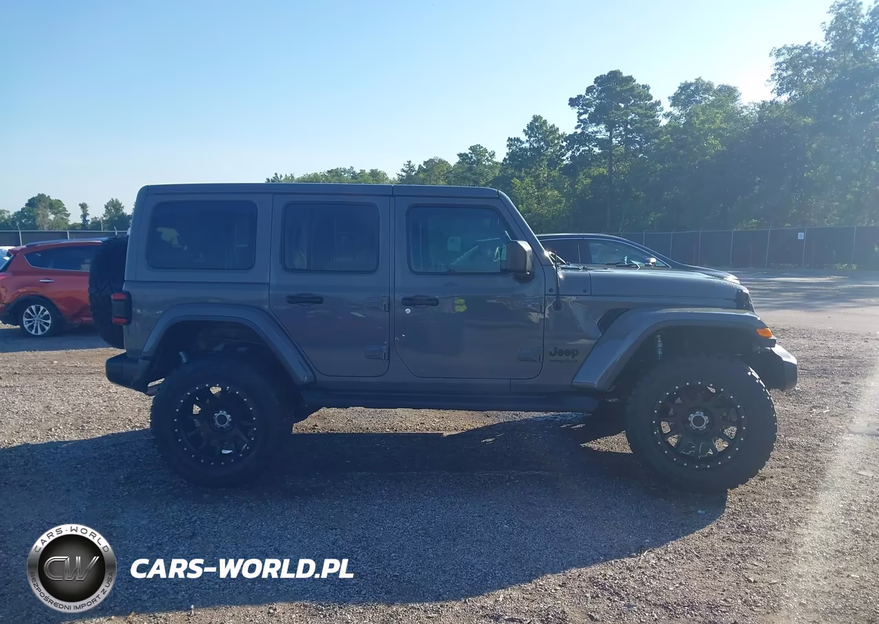 2019 Jeep Wrangler Unlimited Sahara Altitude 4X4 VIN:1C4HJXEN7KW661697 - 13