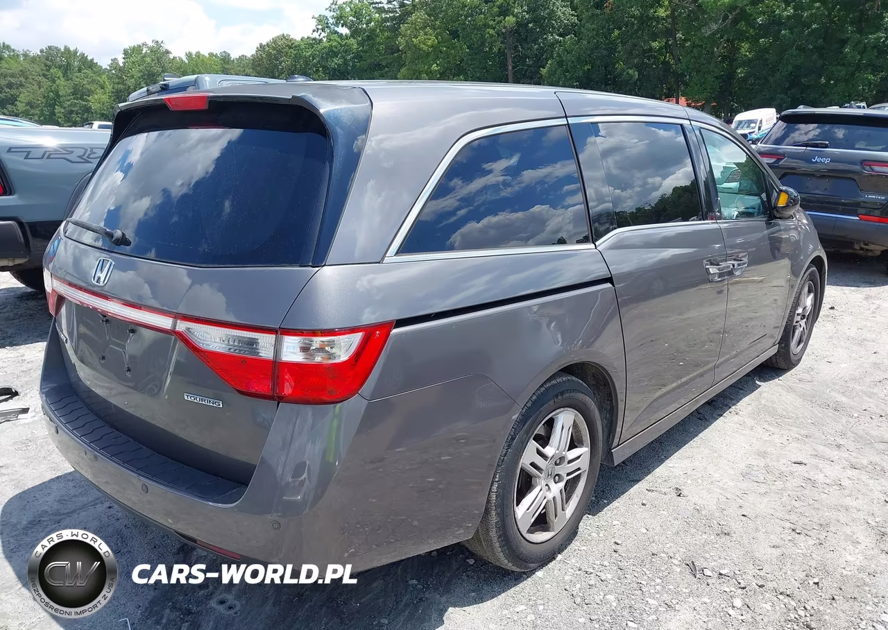 2011 Honda Odyssey Touring-Touring Elite VIN:5FNRL5H9XBB031923 - 4