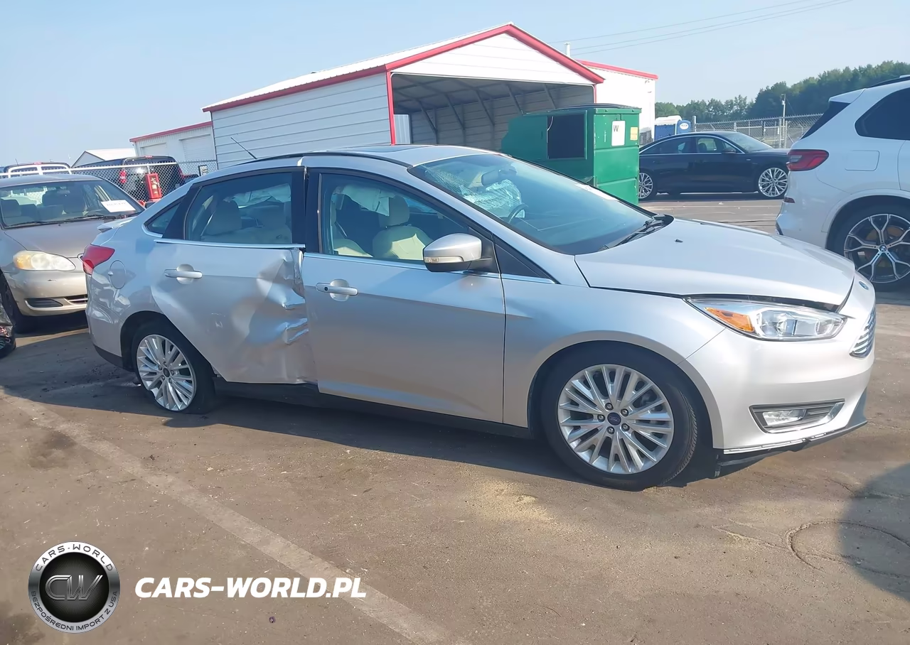 2017 Ford Focus Titanium VIN:1FADP3J21HL238860 - 13