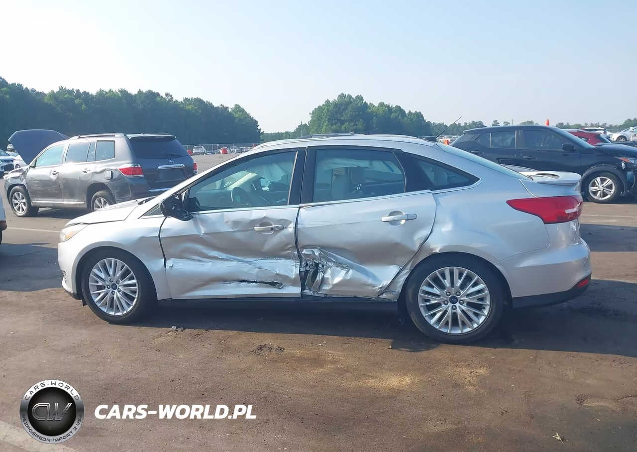 2017 Ford Focus Titanium VIN:1FADP3J21HL238860 - 14