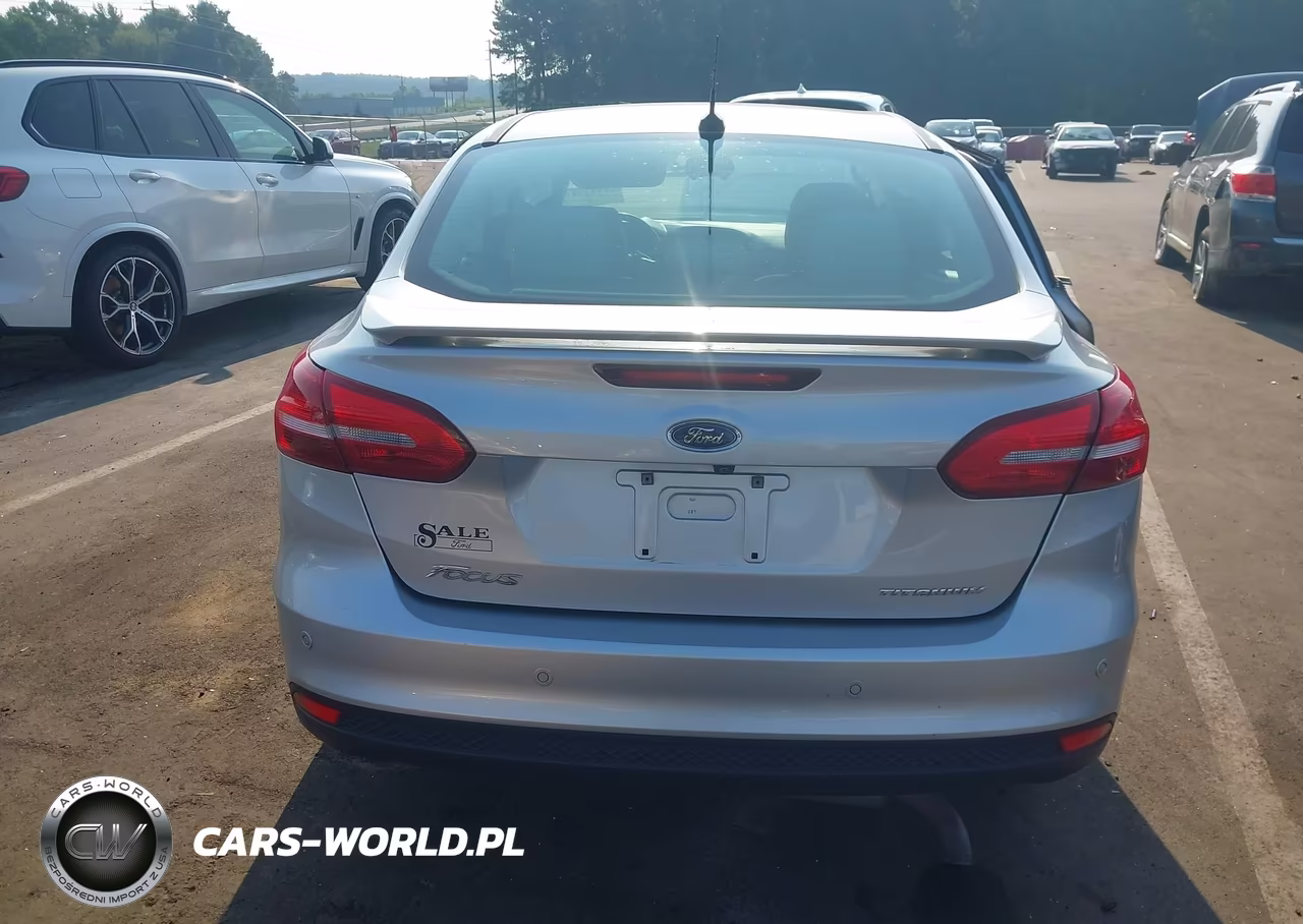 2017 Ford Focus Titanium VIN:1FADP3J21HL238860 - 16