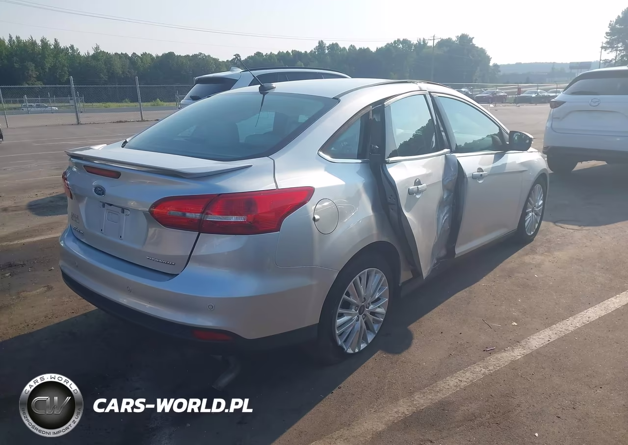 2017 Ford Focus Titanium VIN:1FADP3J21HL238860 - 4