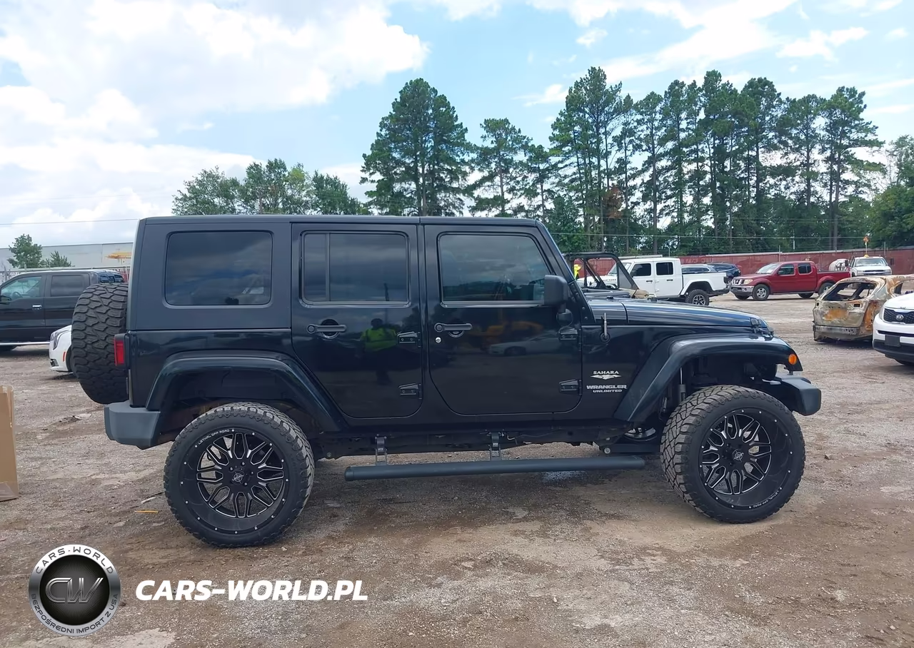 2009 Jeep Wrangler Unlimited Sahara VIN:1J4GA59199L703817 - 13