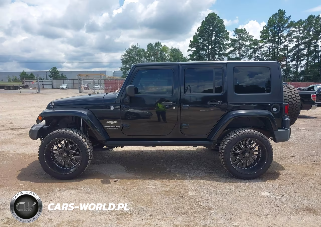 2009 Jeep Wrangler Unlimited Sahara VIN:1J4GA59199L703817 - 14
