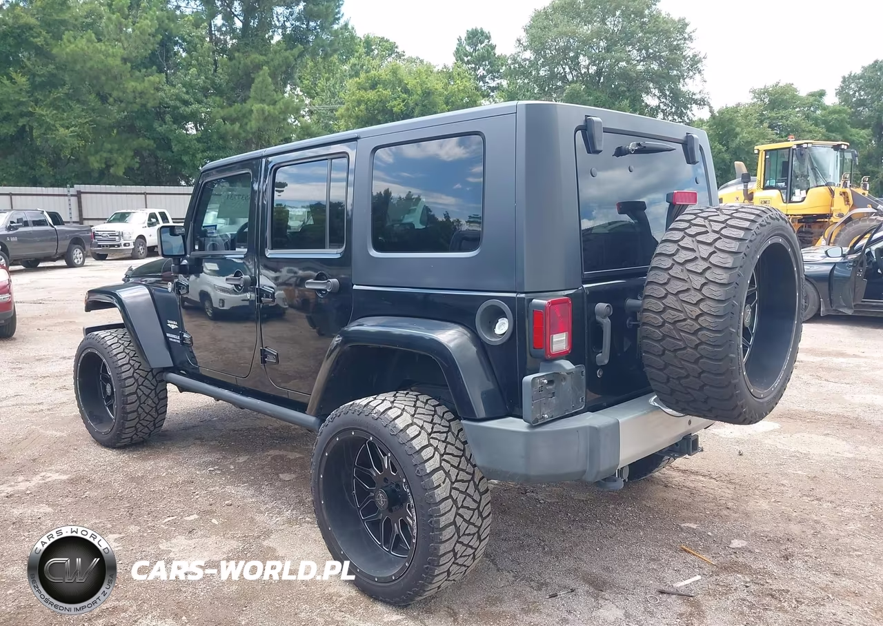 2009 Jeep Wrangler Unlimited Sahara VIN:1J4GA59199L703817 - 3