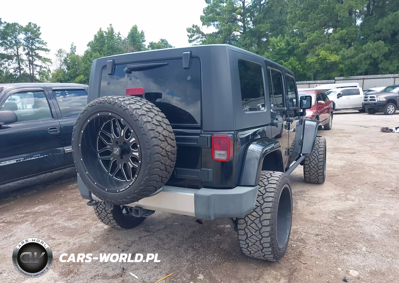 2009 Jeep Wrangler Unlimited Sahara VIN:1J4GA59199L703817 - 4