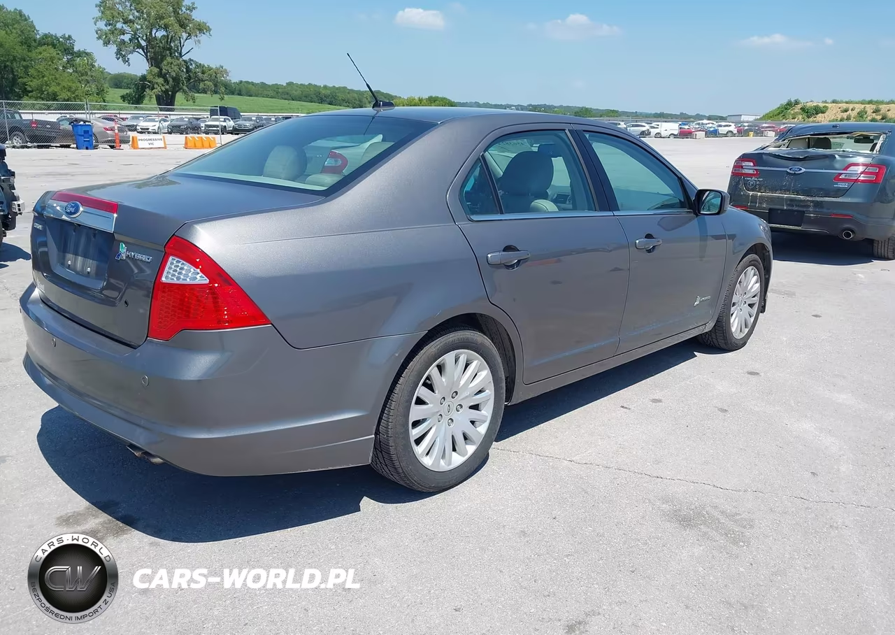 2012 Ford Fusion Hybrid VIN:3FADP0L32CR173385 - 4