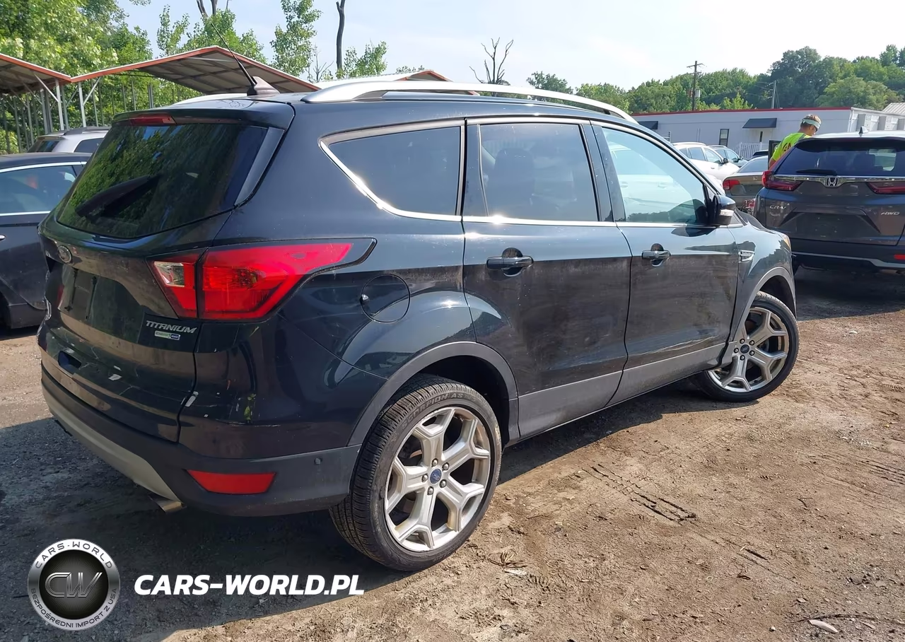 2019 Ford Escape Titanium VIN:1FMCU9J98KUC32713 - 4