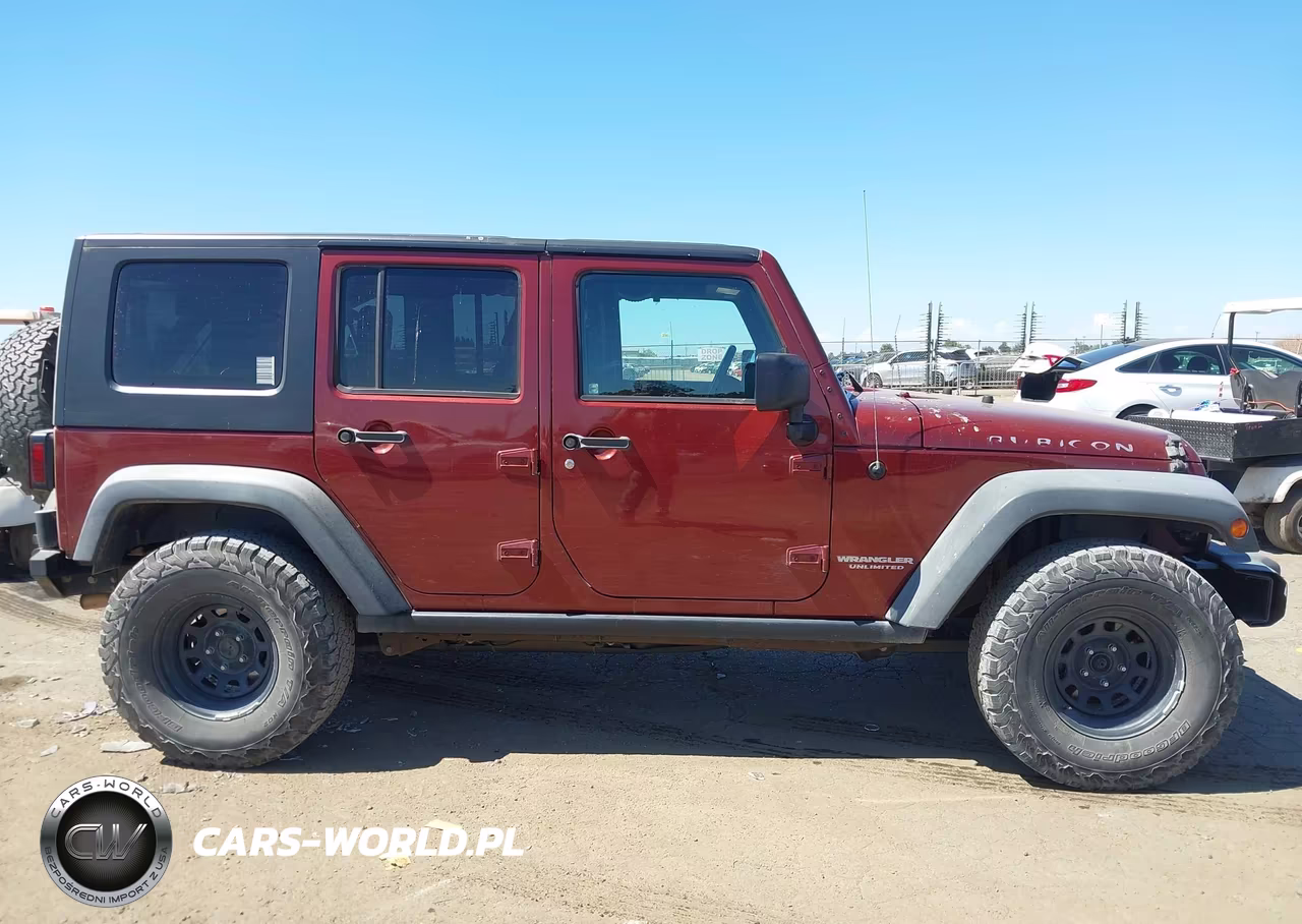 2010 Jeep Wrangler Unlimited Rubicon VIN:1J4HA6H13AL233364 - 14