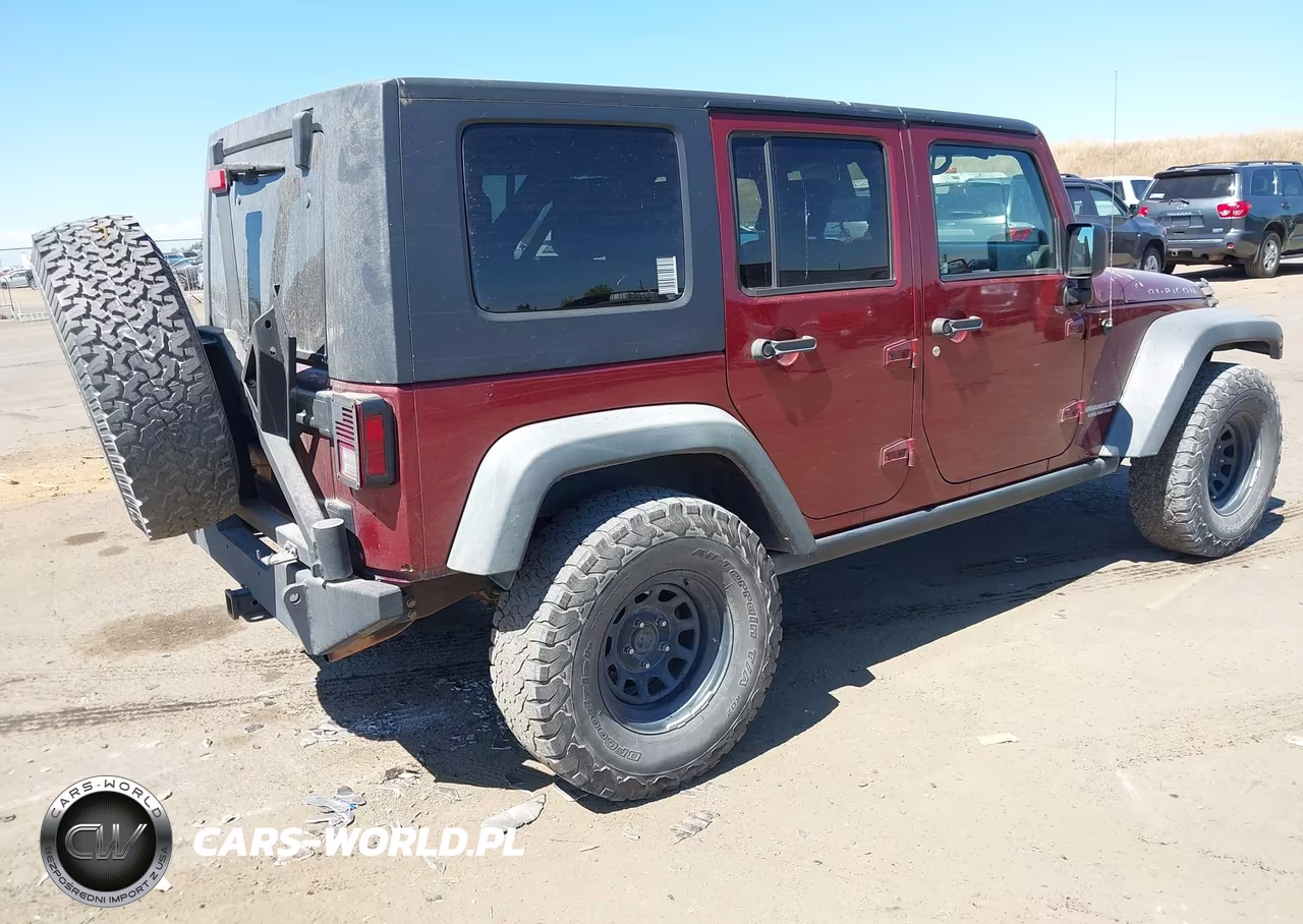2010 Jeep Wrangler Unlimited Rubicon VIN:1J4HA6H13AL233364 - 4