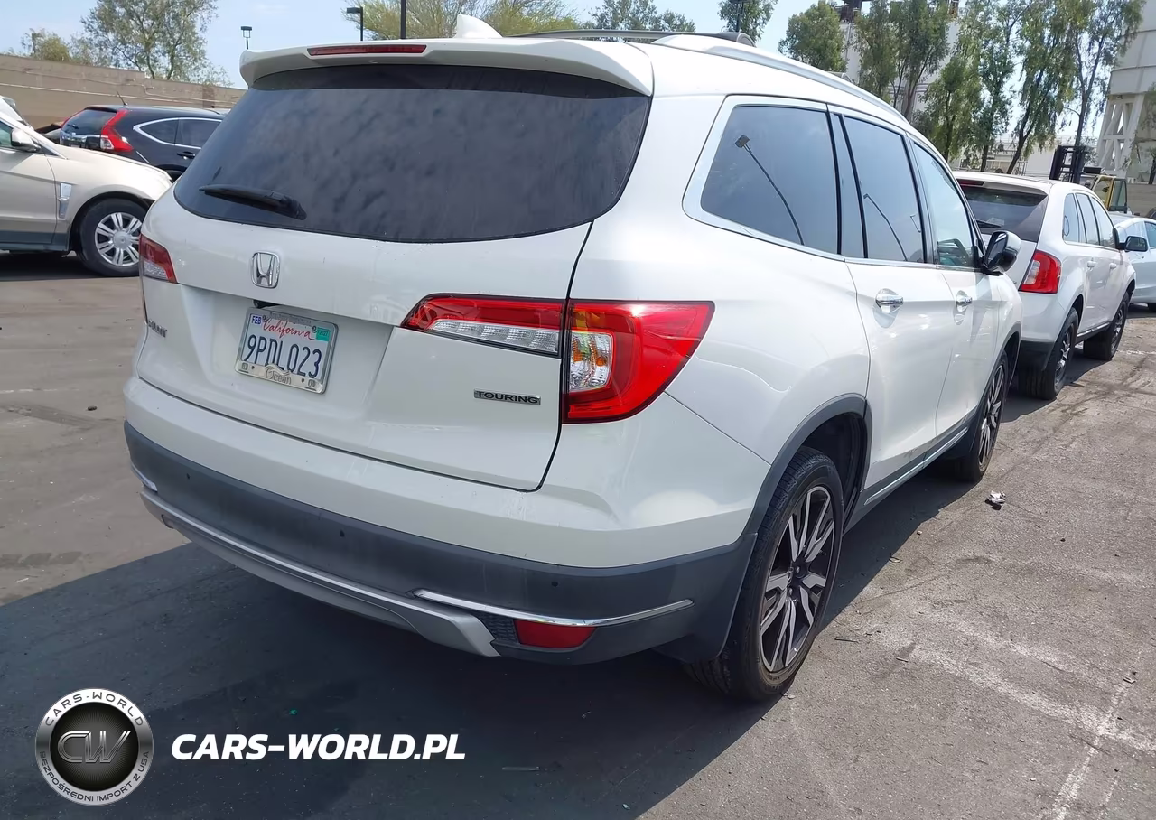 2019 Honda Pilot Touring VIN:5FNYF5H62KB020729 - 4