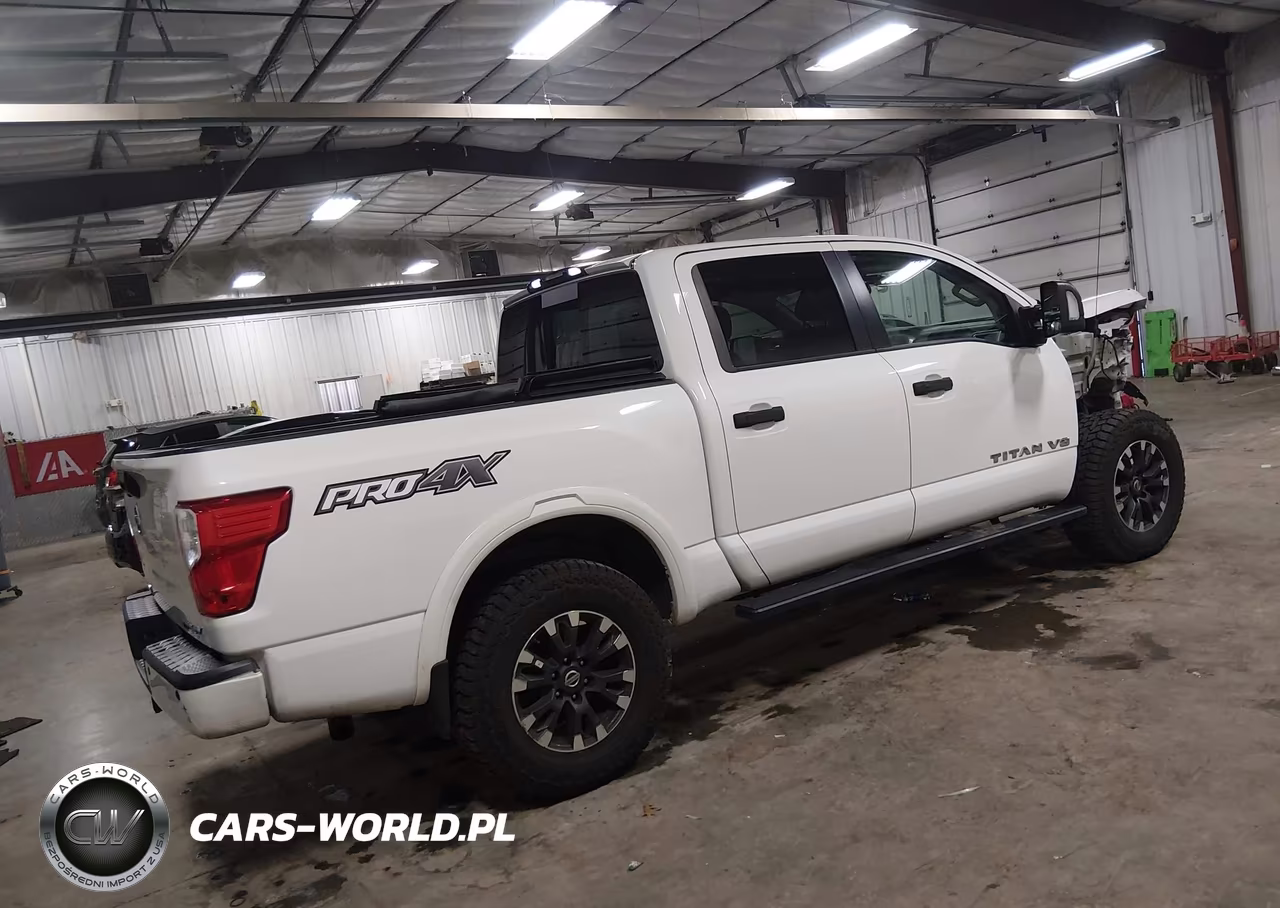 2019 Nissan Titan Pro-4X VIN:1N6AA1E50KN520942 - 4