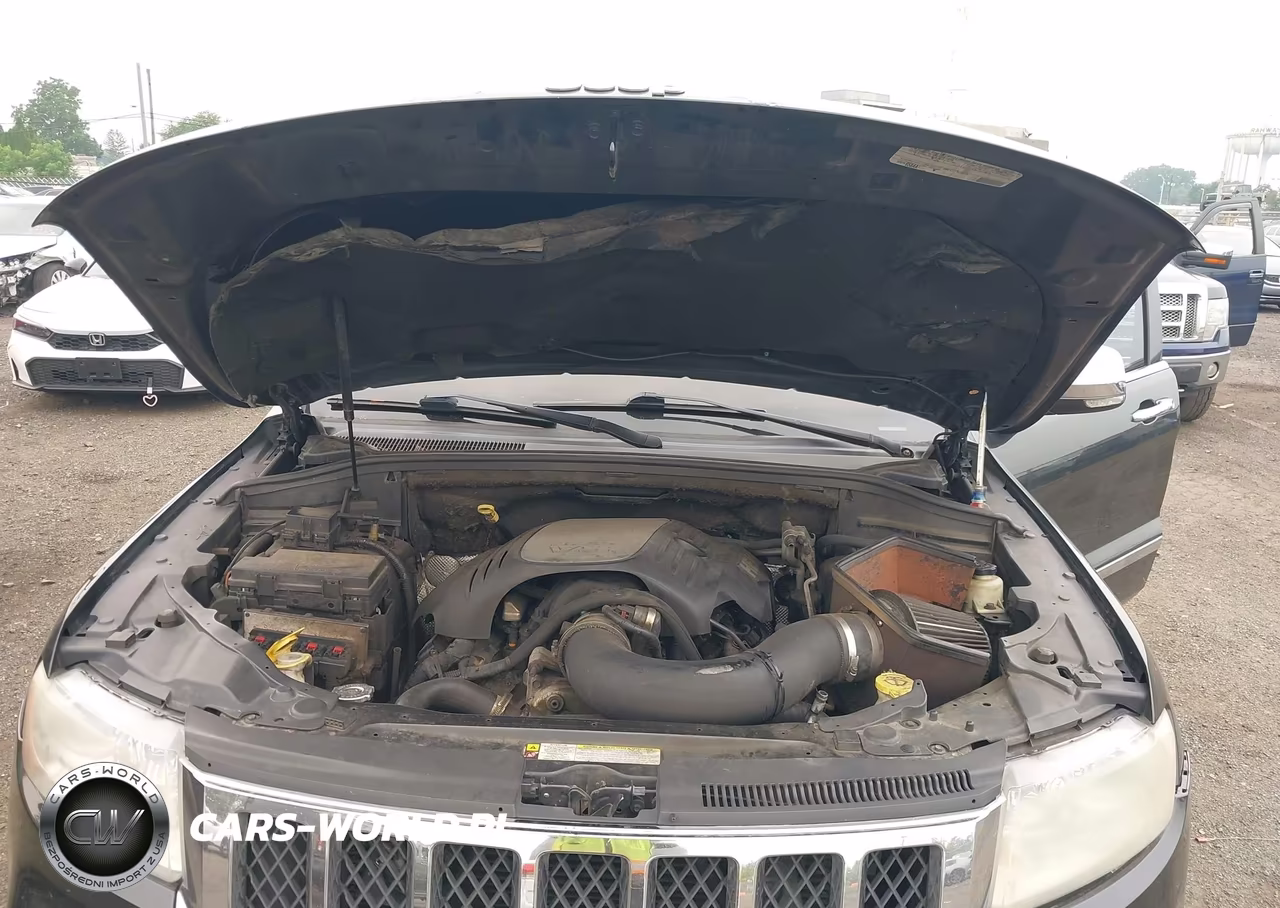 2012 Jeep Grand Cherokee Overland VIN:1C4RJFCT7CC124203 - 10