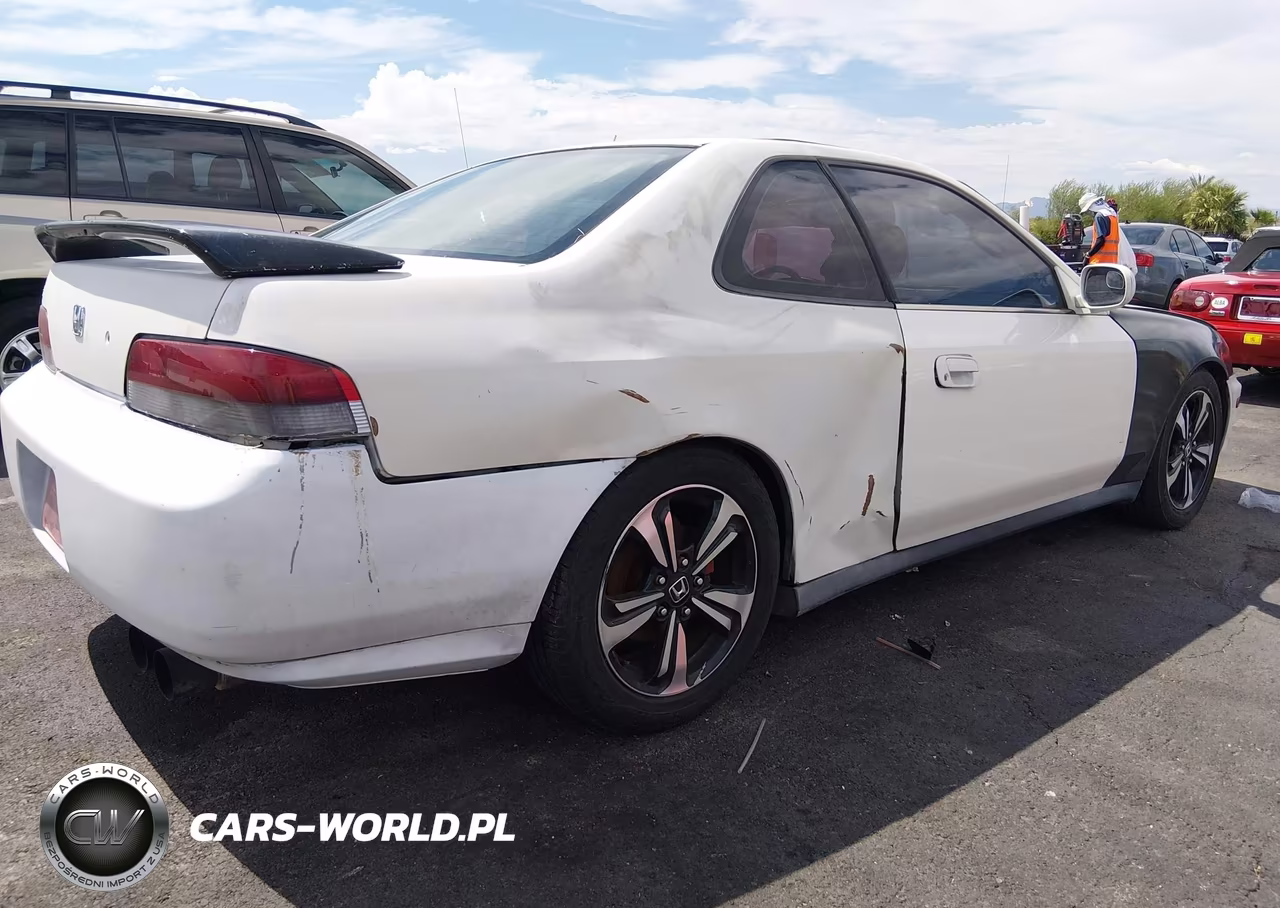 1999 Honda Prelude VIN:JHMBB6245XC010357 - 4
