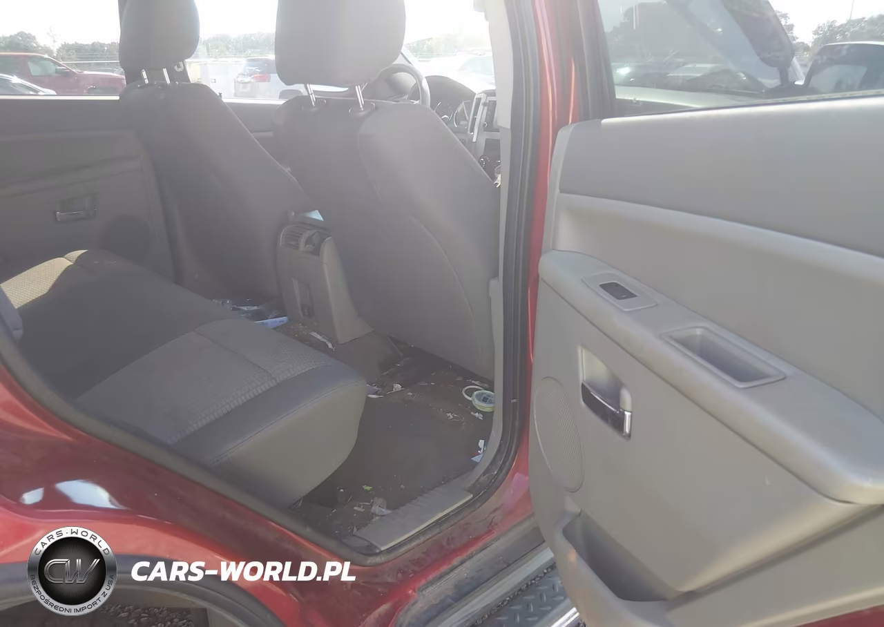 2009 Jeep Grand Cherokee Laredo VIN:1J8GR48K19C547848 - 8