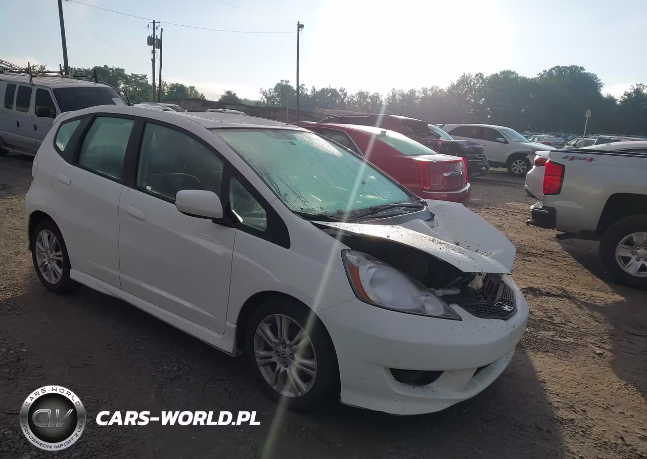 2009 Honda Fit Sport VIN:JHMGE88699S062682 - 1