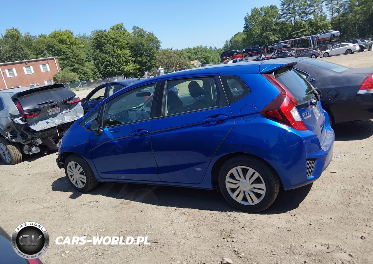 2015 Honda Fit Lx VIN:3HGGK5H59FM734469 - 14