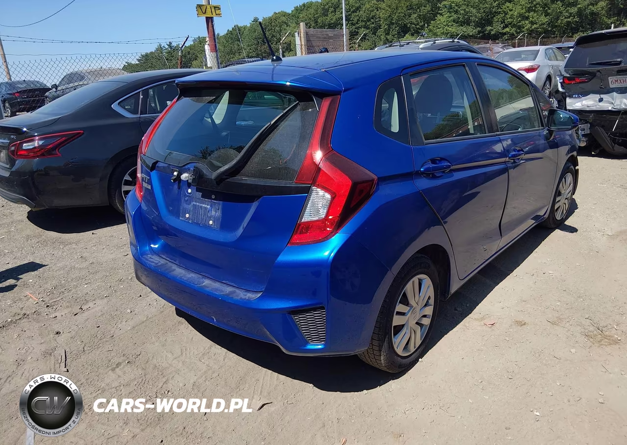 2015 Honda Fit Lx VIN:3HGGK5H59FM734469 - 4
