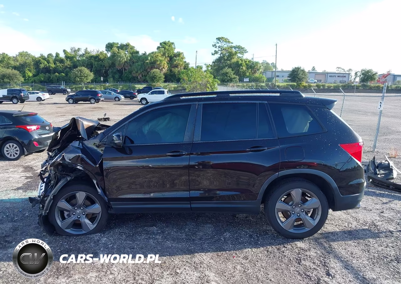 2019 Honda Passport Touring VIN:5FNYF7H97KB006962 - 13
