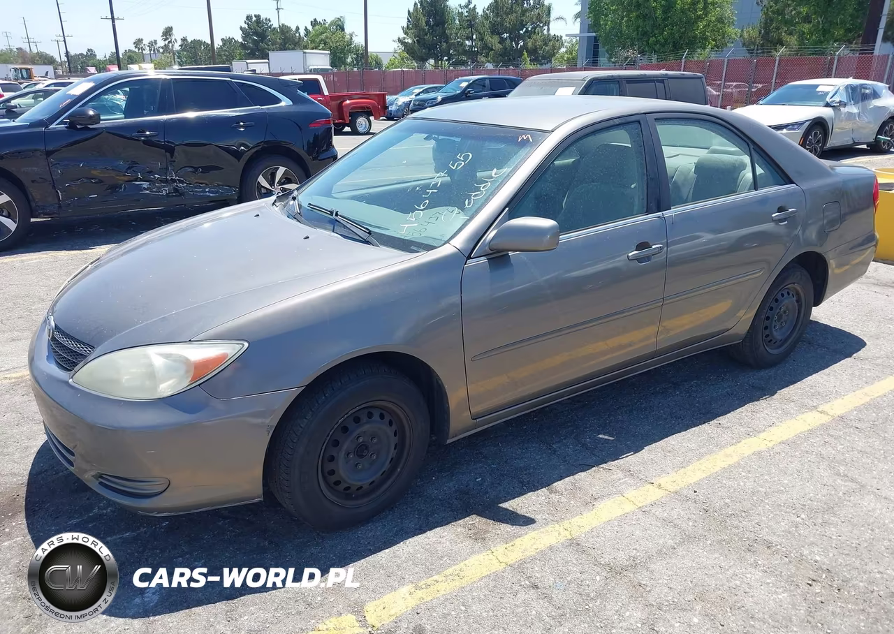 2002 Toyota Camry Le VIN:JTDBE32K220038424 - 2