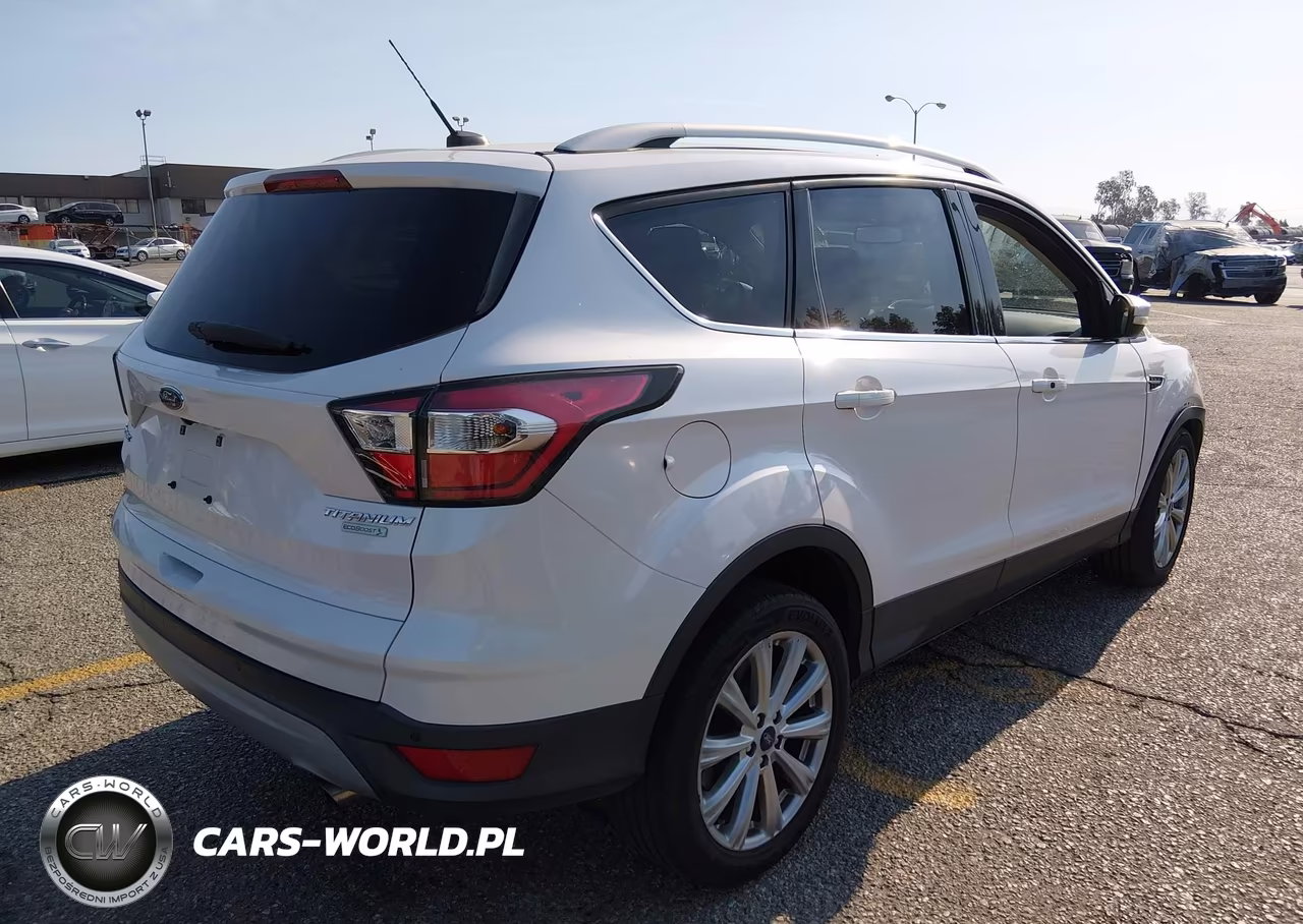 2017 Ford Escape Titanium VIN:1FMCU0J95HUA50827 - 4
