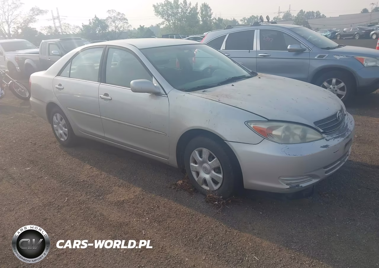 2003 Toyota Camry Le VIN:4T1BE32K03U702497 - 1