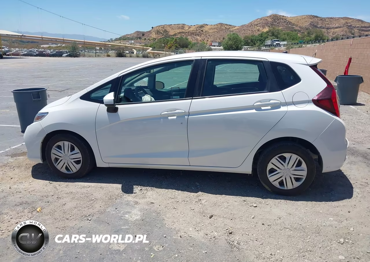 2019 Honda Fit Lx VIN:3HGGK5H47KM751997 - 14
