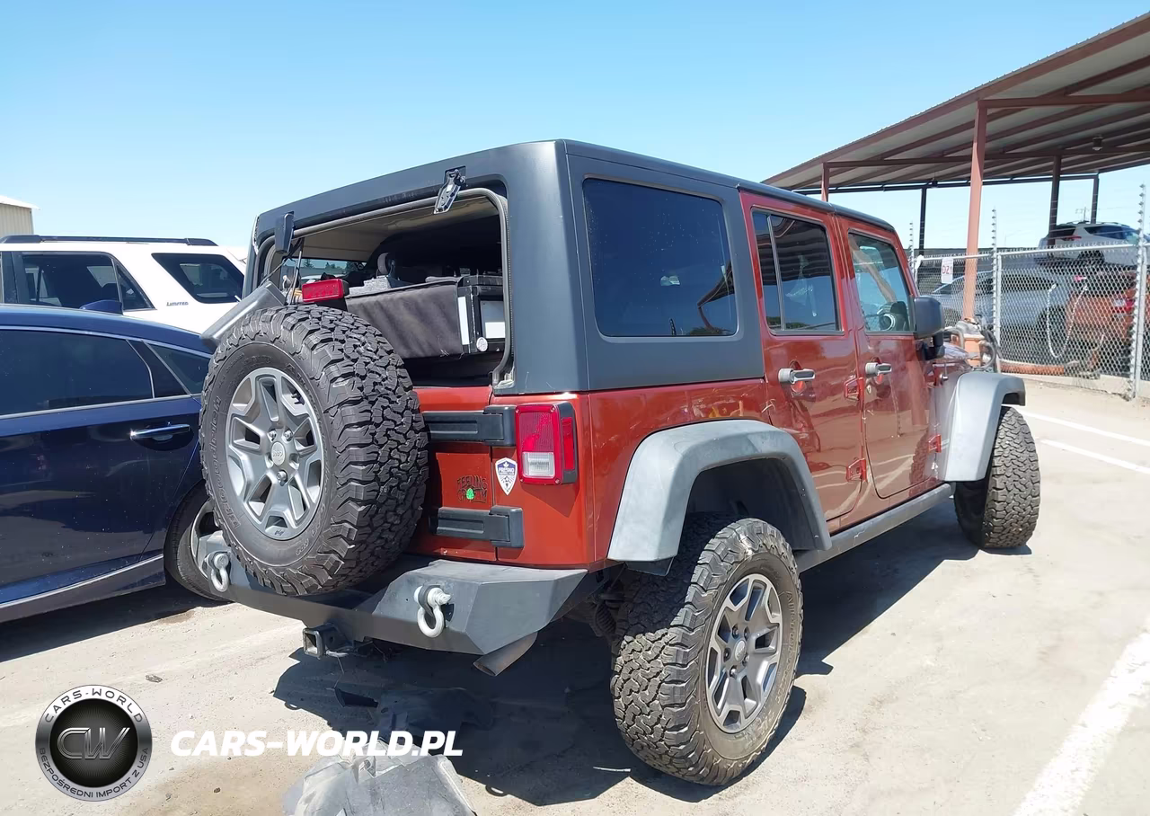 2014 Jeep Wrangler Unlimited Rubicon VIN:1C4BJWFG0EL303363 - 4