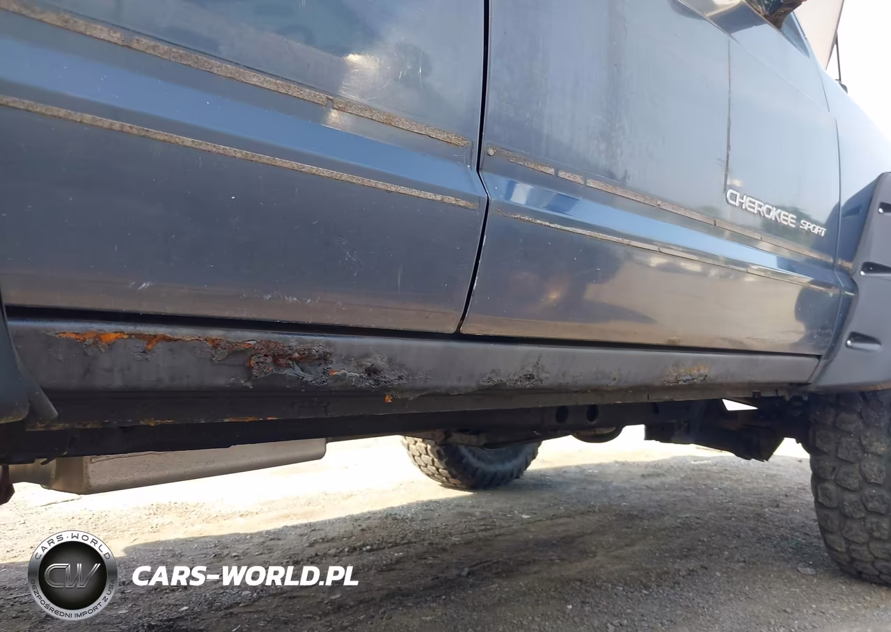 2001 Jeep Cherokee Sport VIN:1J4FF48S11L557032 - 13